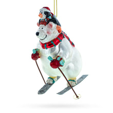 Load image into Gallery viewer, Bear and Penguin Skiing Glass Christmas Ornament