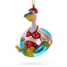 Load image into Gallery viewer, Vacationing Pelican in Swimsuit on an Inflatable Glass Christmas Ornament