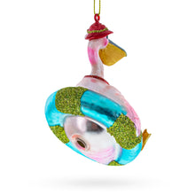 Load image into Gallery viewer, Vacationing Pelican in Swimsuit on an Inflatable Glass Christmas Ornament