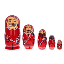 Load image into Gallery viewer, Hockey Players Wooden Nesting Dolls