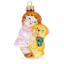 Load image into Gallery viewer, Girl Hugging Teddy Bear Glass Christmas Ornament