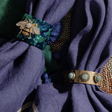 Load image into Gallery viewer, Stripey bee resin napkin rings, green tortoiseshell, set of four