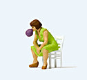 Load image into Gallery viewer, Preiser 28168 HO Scale Sitting Girl Blowing Bubble Gum