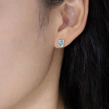 Load image into Gallery viewer, Blue Topaz Stud Earrings 14K Yellow Gold Emerald Cut