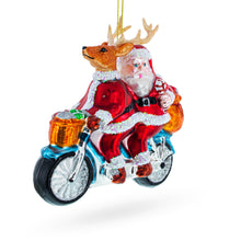 Load image into Gallery viewer, Santa and Reindeer Riding a Tandem Bike Glass Christmas Ornament