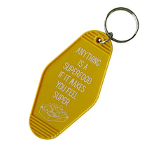 Load image into Gallery viewer, Anything is a Superfood If It Makes You Feel Super Motel Style Keychain in Queso Gold