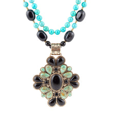 Load image into Gallery viewer, Barcelona Blue Turquoise and Black Onyx Golden Statement Necklace