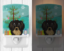 Load image into Gallery viewer, Christmas Tree and Longhair Black and Tan Dachshund Ceramic Night Light BB1585CNL