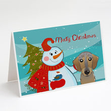 Load image into Gallery viewer, Snowman with Wirehaired Dachshund Greeting Cards -  Blank Note Cards – 8-Pack of Artist-Designed Cards with Envelopes