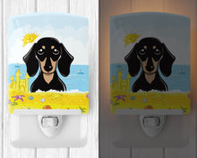 Load image into Gallery viewer, Smooth Black and Tan Dachshund Summer Beach Ceramic Night Light BB2083CNL