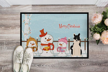 Load image into Gallery viewer, Merry Christmas Carolers Russo-European Laika Spitz Doormat - 24x36 Decorative Floor Mat – Indoor/Outdoor Rug with Artistic Flair BB2360JMAT