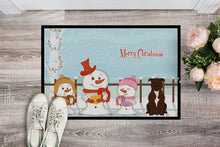 Load image into Gallery viewer, Merry Christmas Carolers Staffordshire Bull Terrier Chocolate Doormat - 24x36 Decorative Floor Mat – Indoor/Outdoor Rug with Artistic Flair BB2379JMAT