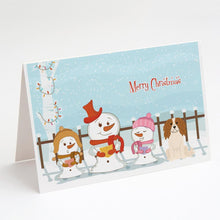 Load image into Gallery viewer, Merry Christmas Carolers Cavalier Spaniel Greeting Cards -  Blank Note Cards – 8-Pack of Artist-Designed Cards with Envelopes