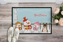 Load image into Gallery viewer, Merry Christmas Carolers Bull Terrier Dark Brindle Doormat - 24x36 Decorative Floor Mat – Indoor/Outdoor Rug with Artistic Flair BB2467JMAT