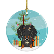 Load image into Gallery viewer, Merry Christmas Tree Wire Haired Dachshund Dapple Ornament - Round Ceramic Ornament – Artist-Designed Keepsake Decoration BB4253CO1