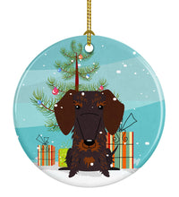Load image into Gallery viewer, Merry Christmas Tree Wire Haired Dachshund Chocolate Ornament - Round Ceramic Ornament – Artist-Designed Keepsake Decoration BB4254CO1
