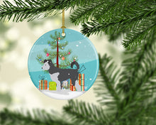 Load image into Gallery viewer, Pumi Christmas Ornament - Round Ceramic Ornament – Artist-Designed Keepsake Decoration BB8459CO1