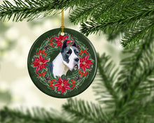 Load image into Gallery viewer, Harlequin Great Dane Poinsetta Wreath Ornament - Round Ceramic Ornament – Artist-Designed Keepsake Decoration