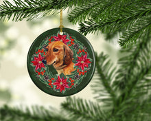 Load image into Gallery viewer, Dachshund Poinsetta Wreath Ornament - Round Ceramic Ornament – Artist-Designed Keepsake Decoration