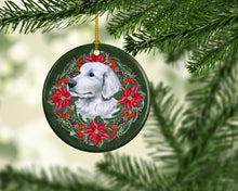 Load image into Gallery viewer, Maremma Sheepdog Poinsetta Wreath Ornament - Round Ceramic Ornament – Artist-Designed Keepsake Decoration