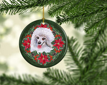 Load image into Gallery viewer, Medium White Poodle Poinsetta Wreath Ornament - Round Ceramic Ornament – Artist-Designed Keepsake Decoration