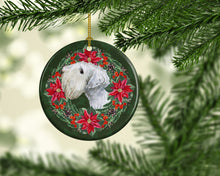 Load image into Gallery viewer, Sealyham Terrier Poinsetta Wreath Ornament - Round Ceramic Ornament – Artist-Designed Keepsake Decoration