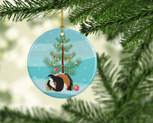 Load image into Gallery viewer, Sheba Guinea Pig Merry Christmas Ornament - Round Ceramic Ornament – Artist-Designed Keepsake Decoration