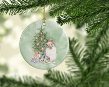 Load image into Gallery viewer, Christmas Sheltie Shetland Sheepdog Merle Ornament - Round Ceramic Ornament – Artist-Designed Keepsake Decoration
