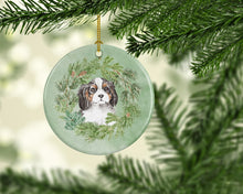 Load image into Gallery viewer, Cavalier Spaniel Puppy Tricolor Christmas Wreath Ceramic Ornament
