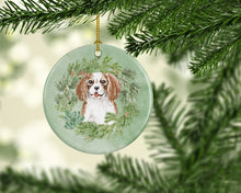 Load image into Gallery viewer, Cavalier Spaniel Blenheim Puppy Smiling Christmas Wreath Ceramic Ornament