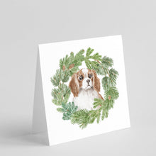 Load image into Gallery viewer, Cavalier King Charles Spaniel Blenheim Puppy Wide Eyed with Christmas Wreath Square Greeting Cards -  Blank Note Cards – 8-Pack of Artist-Designed Cards with Envelopes