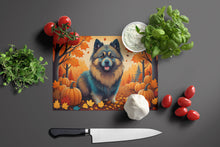 Load image into Gallery viewer, Keeshond Fall Glass Cutting Boards – Durable, Decorative Kitchen Art Large