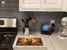 Load image into Gallery viewer, Norwich Terrier Fall Glass Cutting Boards – Durable, Decorative Kitchen Art Large