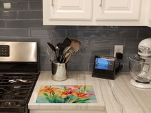 Load image into Gallery viewer, Lilies in Watercolor Glass Cutting Boards – Durable, Decorative Kitchen Art Large