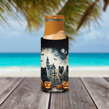 Load image into Gallery viewer, Keeshond Spooky Halloween Slim Can Huggers – Fun, Functional Drink Coolers for Every Occasion