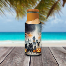 Load image into Gallery viewer, Keeshond Spooky Halloween Slim Can Huggers – Fun, Functional Drink Coolers for Every Occasion
