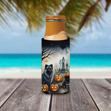 Load image into Gallery viewer, Keeshond Spooky Halloween Slim Can Huggers – Fun, Functional Drink Coolers for Every Occasion