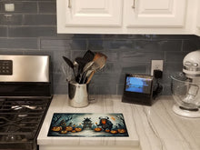 Load image into Gallery viewer, Krampus The Christmas Demon Spooky Halloween Glass Cutting Boards – Durable, Decorative Kitchen Art Large