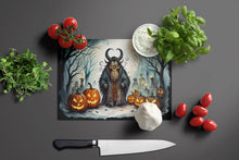 Load image into Gallery viewer, Krampus The Christmas Demon Spooky Halloween Glass Cutting Boards – Durable, Decorative Kitchen Art Large