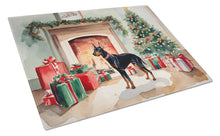 Load image into Gallery viewer, Doberman Pinscher Cozy Christmas Glass Cutting Boards – Durable, Decorative Kitchen Art Large