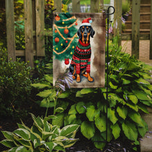 Load image into Gallery viewer, Black and Tan Coonhound Christmas Garden Flag – Cozy Dog Holiday Decor with Tree &amp; Presents