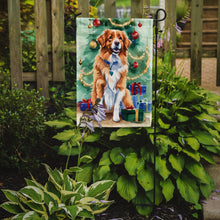 Load image into Gallery viewer, Nova Scotia Duck Toller Christmas Garden Flag – Cozy Dog Holiday Decor with Tree &amp; Presents