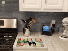 Load image into Gallery viewer, Giant Schnauzer Christmas Cookies Glass Cutting Boards – Durable, Decorative Kitchen Art