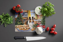 Load image into Gallery viewer, Sheltie Christmas Cookies Glass Cutting Boards – Durable, Decorative Kitchen Art