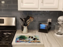Load image into Gallery viewer, Sheltie Christmas Cookies Glass Cutting Boards – Durable, Decorative Kitchen Art