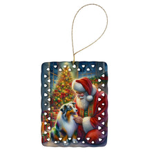 Load image into Gallery viewer, Australian Shepherd and Santa Claus Porcelain Ornament