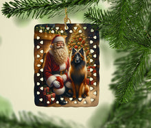 Load image into Gallery viewer, Belgian Tervuren and Santa Claus Porcelain Ornament