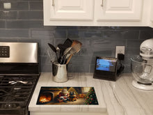Load image into Gallery viewer, Belgian Tervuren and Santa Claus Glass Cutting Boards – Durable, Decorative Kitchen Art