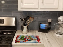 Load image into Gallery viewer, Boston Terrier and Santa Claus Glass Cutting Boards – Durable, Decorative Kitchen Art
