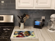 Load image into Gallery viewer, Cairn Terrier and Santa Claus Glass Cutting Boards – Durable, Decorative Kitchen Art